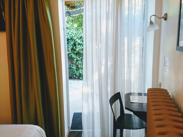 Accostage Hôtel Plage de la Concurrence : photo 9 de la chambre chambre double ou lits jumeaux avec patio