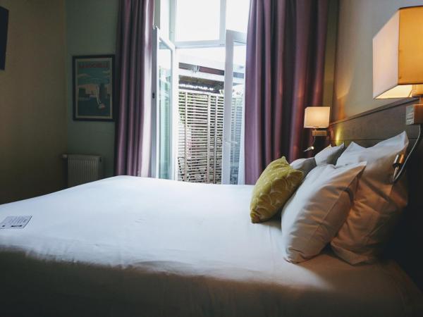 Accostage Hôtel Plage de la Concurrence : photo 2 de la chambre chambre double ou lits jumeaux avec patio