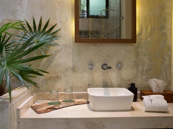 Ya'ax Hotel Boutique : photo 1 de la chambre suite lit king-size