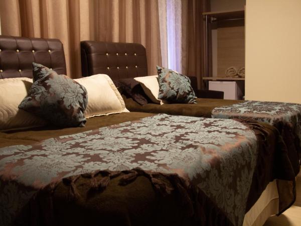 Hotel Brasilia Curitiba : photo 6 de la chambre chambre triple supérieure