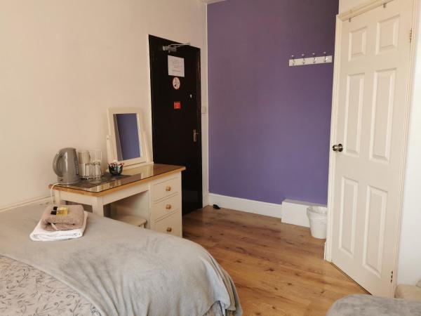 Adams Guest House : photo 2 de la chambre chambre familiale (3 adultes)