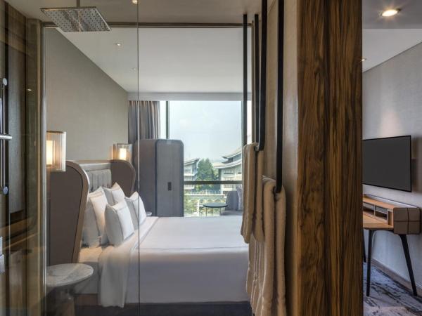 Swissôtel Jakarta PIK Avenue : photo 4 de la chambre chambre lit king-size exécutive suisse - Étage exécutif