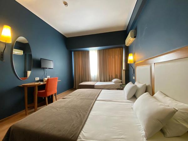 Olympic Hotel : photo 7 de la chambre chambre triple (2 adultes & 1 enfant)