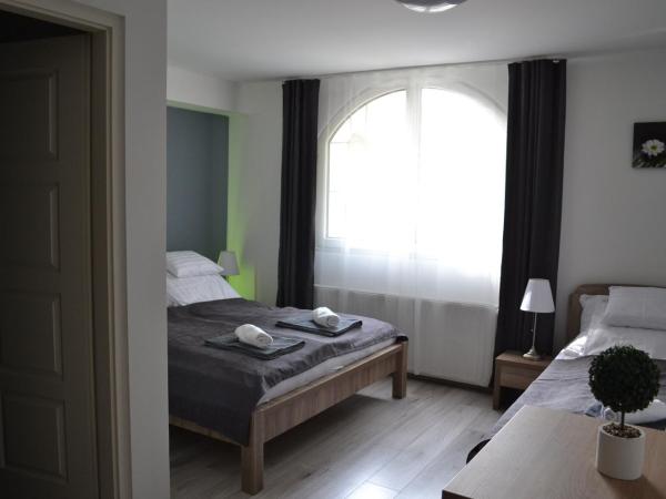 Főnix Design Rooms : photo 7 de la chambre chambre triple