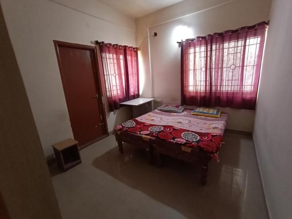 Professionals Pride PG : photo 3 de la chambre chambre double avec salle de bains privative