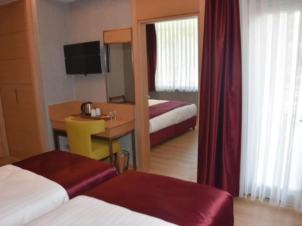 MY GARDEN SUITES : photo 1 de la chambre suite familiale