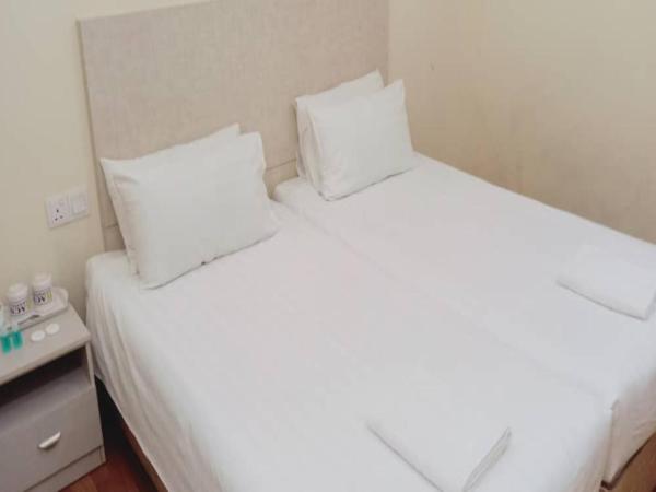 1ACS Residence : photo 1 de la chambre chambre lits jumeaux standard