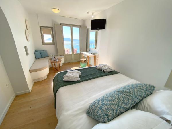 Panorama Boutique Hotel : photo 1 de la chambre chambre double standard avec vue sur caldera