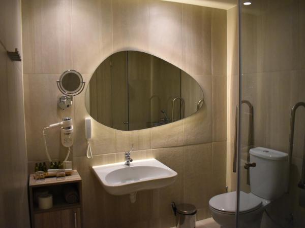 Green Suites Boutique Hotel : photo 5 de la chambre chambre double ou lits jumeaux - accessible aux personnes à mobilité réduite