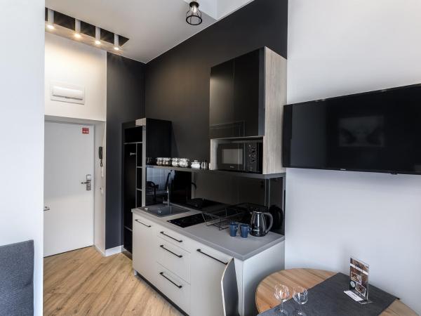 Apartamenty Nowa Kamienica Częstochowa Centrum Szymanowskiego 22A : photo 3 de la chambre appartement