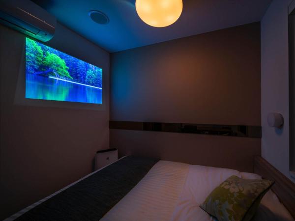 Super Hotel Tokyo Hamamatsucho : photo 2 de la chambre chambre théâtre