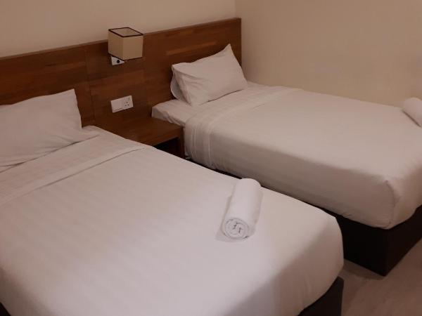 Hotin Inn : photo 1 de la chambre chambre lits jumeaux sans fenêtre