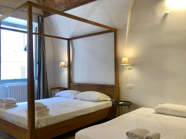 Dimora Cavalieri : photo 8 de la chambre chambre double deluxe (2 adultes + 1 enfant)