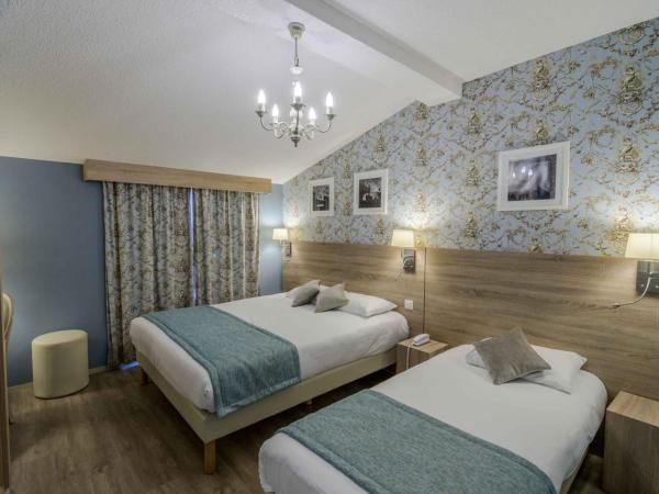 Hôtel l'Aragon : photo 5 de la chambre chambre triple confort