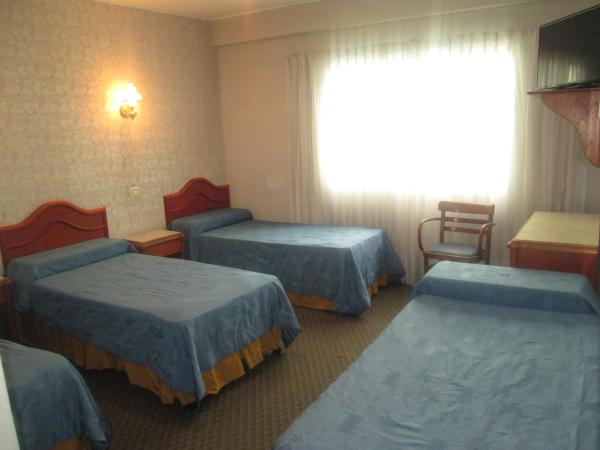 Hotel Luey : photo 2 de la chambre chambre quadruple