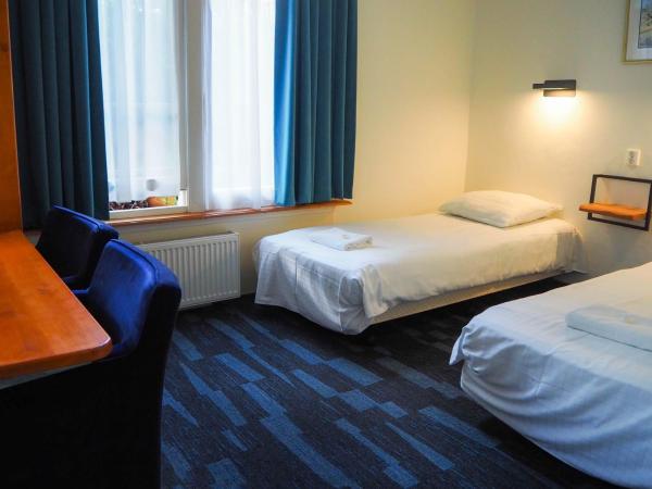 Euphemia Budget Old City Canal Zone : photo 4 de la chambre chambre lits jumeaux avec salle de bains privative