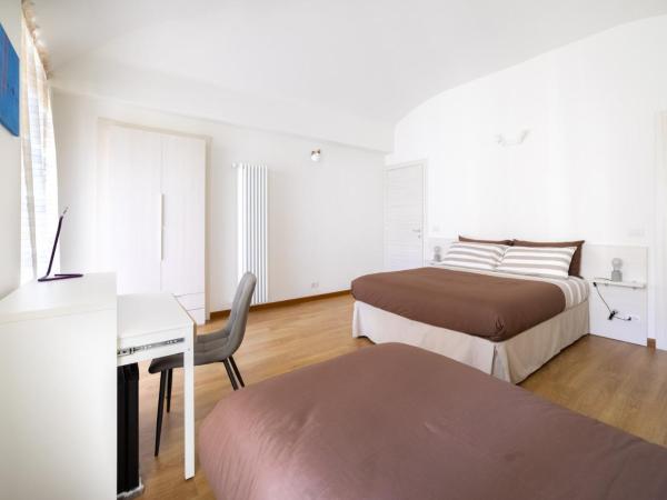 TO.STA BwithoutB HOME SHARING NEL CENTRO DI TORINO : photo 8 de la chambre chambre triple