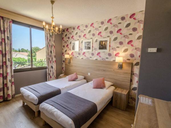 Hôtel l'Aragon : photo 3 de la chambre chambre lits jumeaux