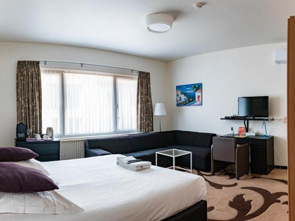 Hotel Cathedral Gent Centrum : photo 1 de la chambre chambre double avec coin salon