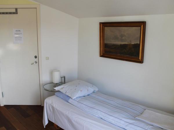 Lavilla Guesthouse : photo 10 de la chambre chambre familiale avec salle de bains commune