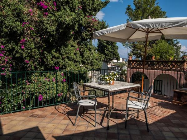 Hotel Villino Gallodoro : photo 7 de la chambre chambre triple supérieure