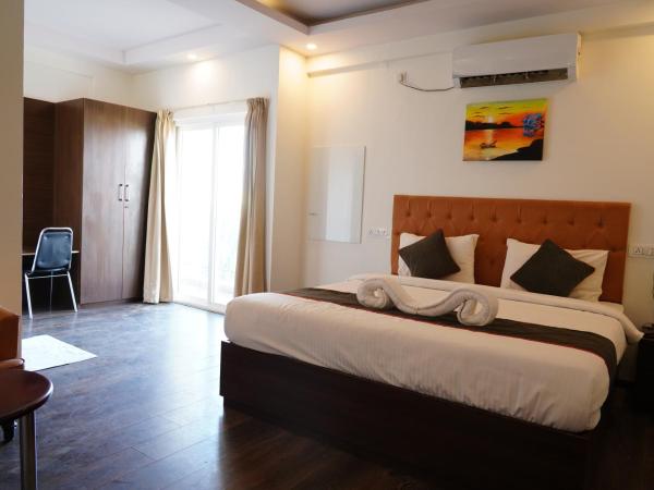 Suraksha Stay ITPL Hotel Banglore : photo 5 de la chambre chambre lit king-size deluxe