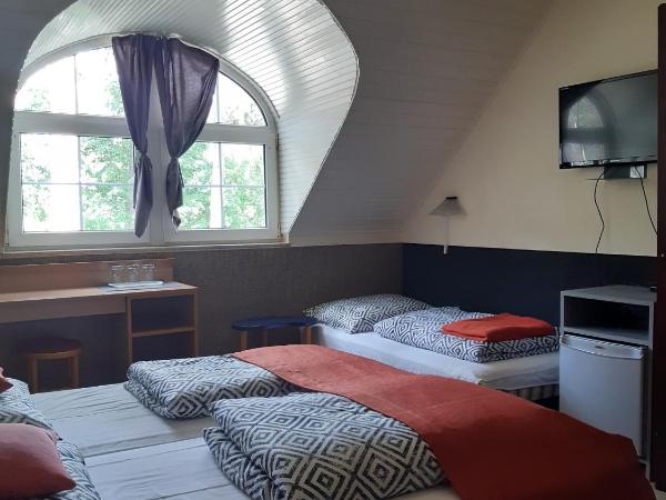 Berg Toboz Panzió : photo 6 de la chambre chambre triple