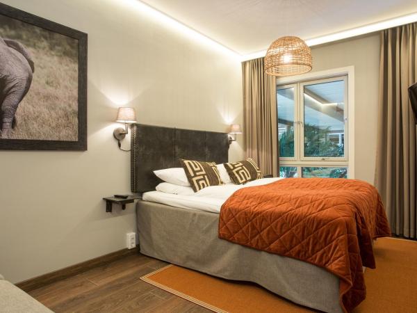 Dyreparken Safarihotell : photo 2 de la chambre chambre double avec canapé-lit