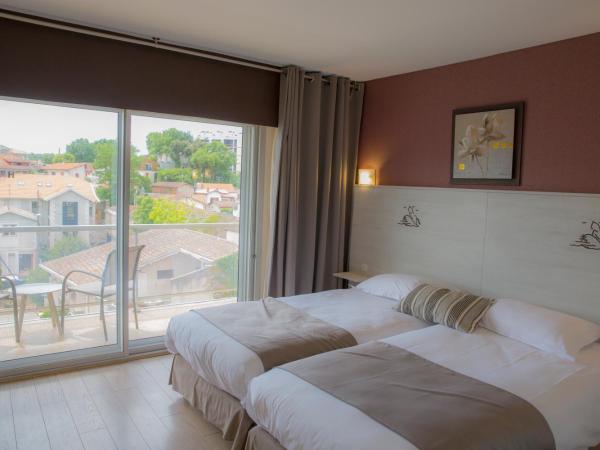 Arc Hôtel Sur Mer : photo 6 de la chambre chambre lits jumeaux - vue sur jardin