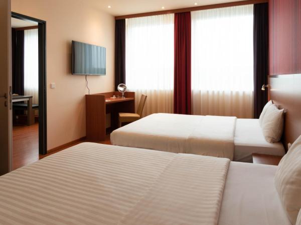 Star G Hotel München Schwabing : photo 3 de la chambre appartement