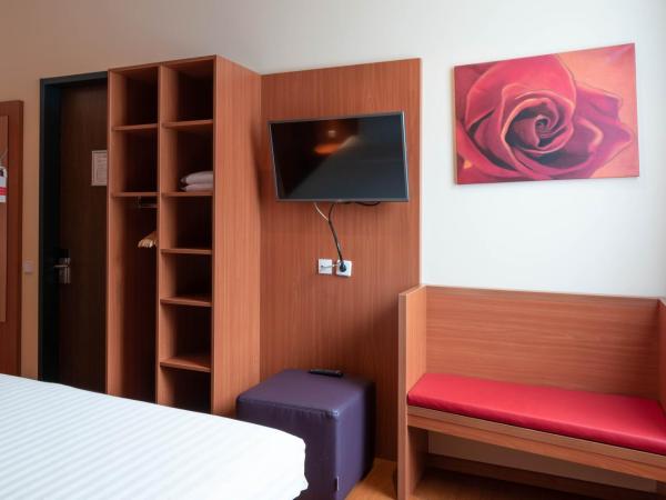 Star G Hotel München Schwabing : photo 2 de la chambre chambre lit queen-size - accessible aux personnes à mobilité réduite
