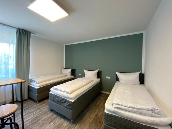 Excellentas Apartments Hannover : photo 4 de la chambre chambre triple confort