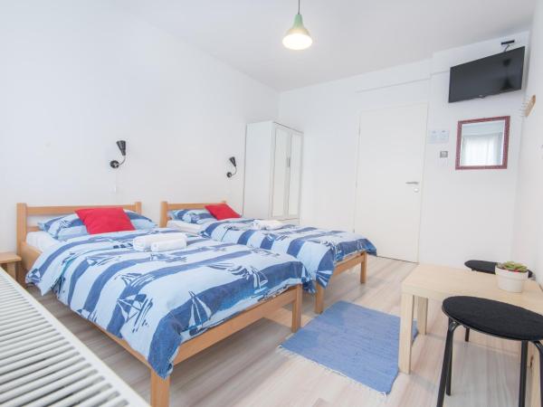 The Dots Hostel : photo 5 de la chambre chambre lits jumeaux standard avec salle de bains commune