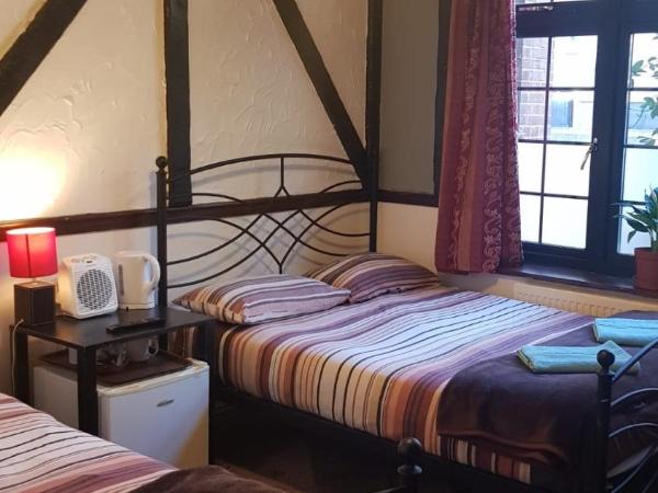 Hour Glass Hotel : photo 6 de la chambre chambre triple avec salle de bains