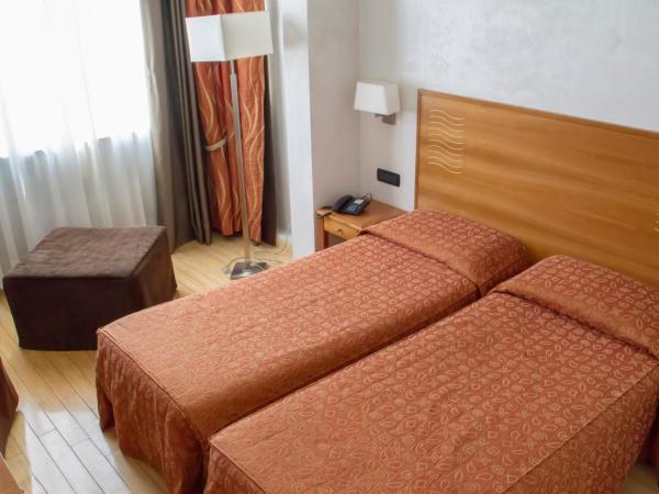 Hotel Continental : photo 3 de la chambre chambre triple