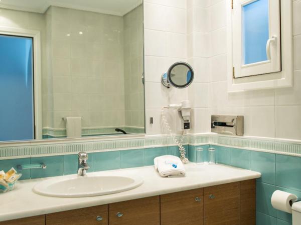 Poseidon Hotel Suites : photo 2 de la chambre chambre deluxe double ou lits jumeaux