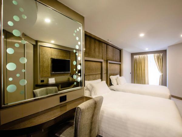Centara Azure Hotel Pattaya : photo 1 de la chambre chambre familiale deluxe