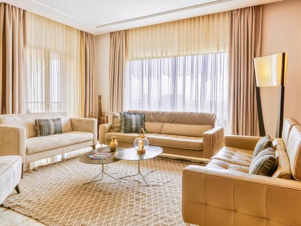 ADAM Hotel Suites : photo 3 de la chambre suite deluxe lit king-size - vue sur lac