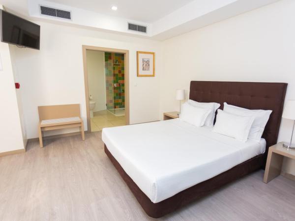 Castelo Santa Catarina : photo 4 de la chambre chambre double/lits jumeaux - jardin