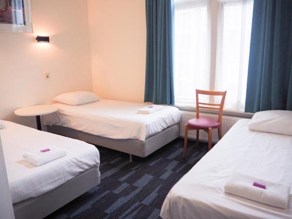 Euphemia Budget Old City Canal Zone : photo 6 de la chambre chambre triple avec salle de bains privative