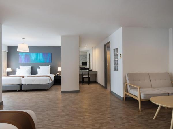 Journeyhub Pattaya Central : photo 2 de la chambre suite familiale