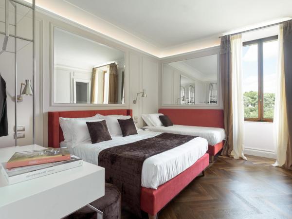 Albergo Chiusarelli : photo 1 de la chambre chambre quadruple