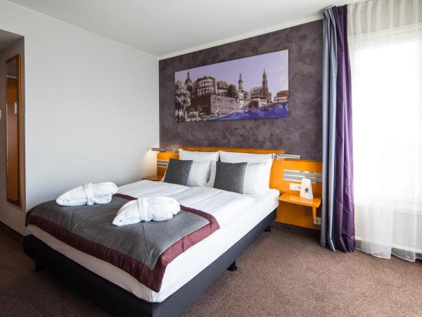 Ramada by Wyndham Dresden : photo 2 de la chambre chambre lits jumeaux supérieure