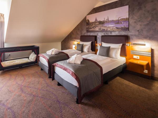 Ramada by Wyndham Dresden : photo 2 de la chambre suite junior supérieure