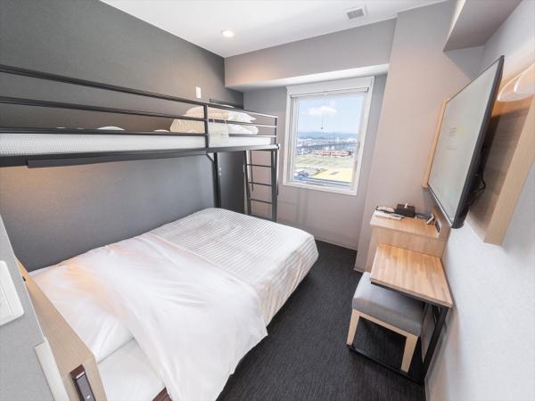 Super Hotel Tokyo Akabane Eki Minamiguchi : photo 3 de la chambre chambre double ou lits jumeaux avec lit d'appoint