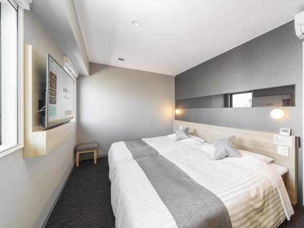 Super Hotel Tokyo Akabane Eki Minamiguchi : photo 2 de la chambre chambre lits jumeaux deluxe