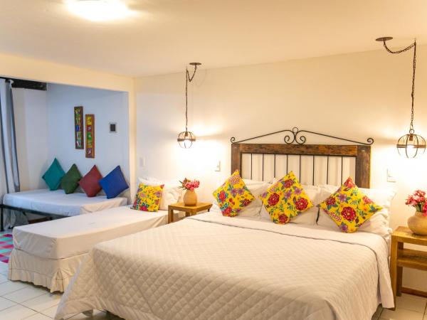 Pousada Casa do Catavento : photo 1 de la chambre chambre double supérieure avec balcon