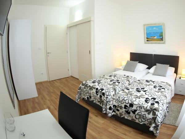 A&M Apartment and Rooms : photo 10 de la chambre chambre lits jumeaux