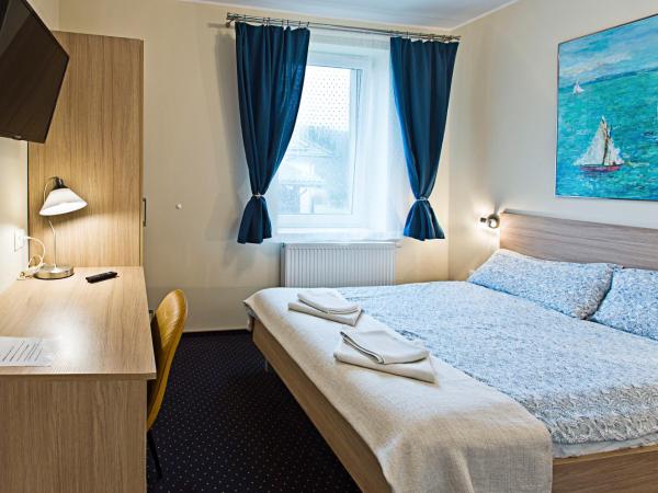 Olkuska 107 A : photo 1 de la chambre chambre double