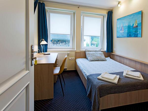 Olkuska 107 A : photo 7 de la chambre chambre double